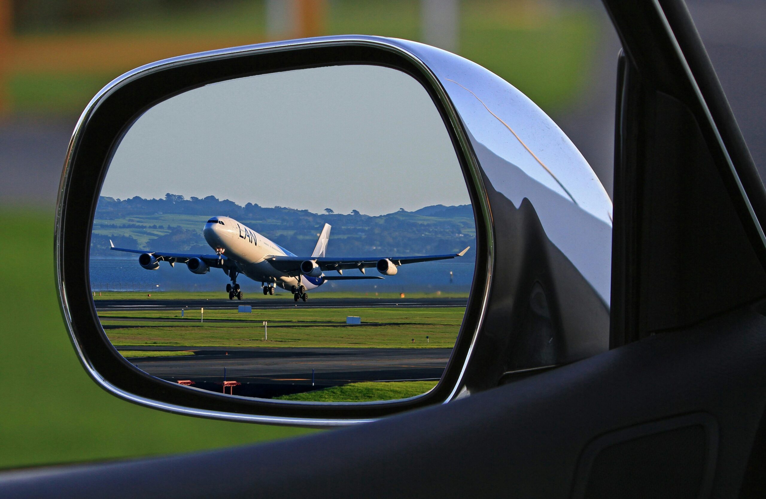 A plane soaring into the sky during takeoff, symbolizing the momentum needed to achieve lift-off for business growth.