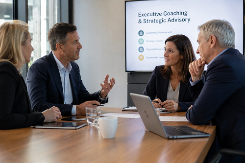 SME leadership team discussing executive coaching and strategic advisory support