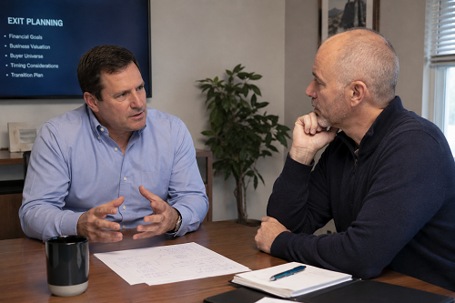 Founder discussing business exit planning with a trusted advisor Founder discussing business exit planning with a trusted advisor