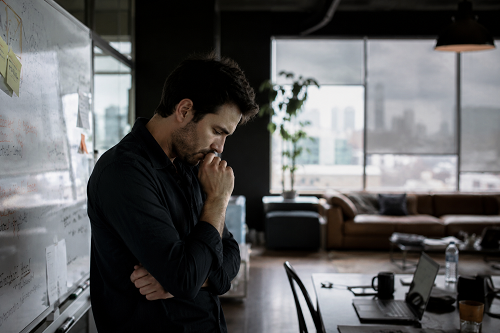 Founder reflecting privately under business leadership pressure