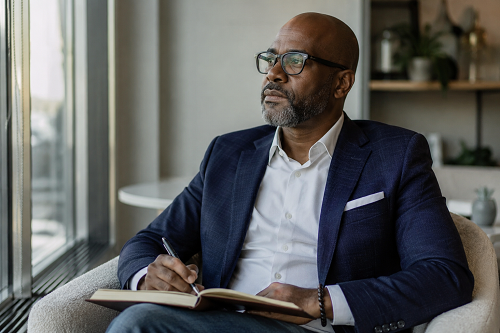 Executive leader reflecting on personal growth and leadership development