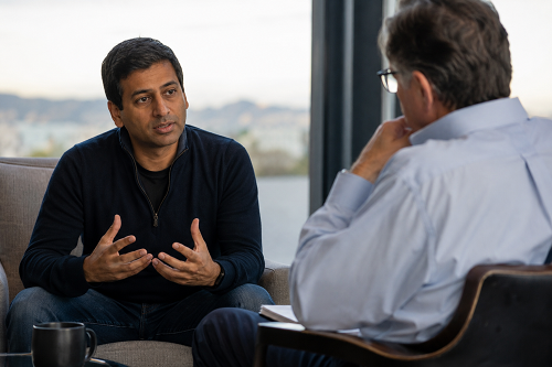 Founder discussing leadership pressure in a confidential advisory session