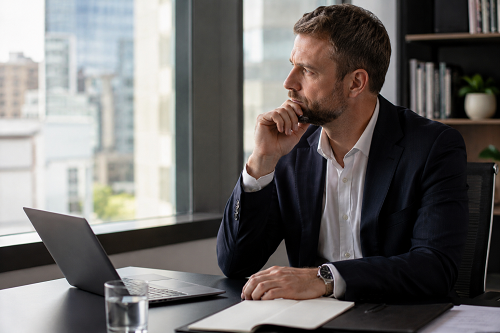 Business leader reflecting on emotional resilience and leadership growth