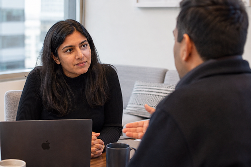 Founder listening carefully during a constructive leadership conversation