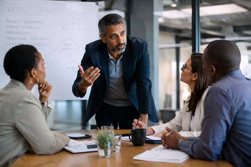 Business founder discussing leadership development and strategic growth
