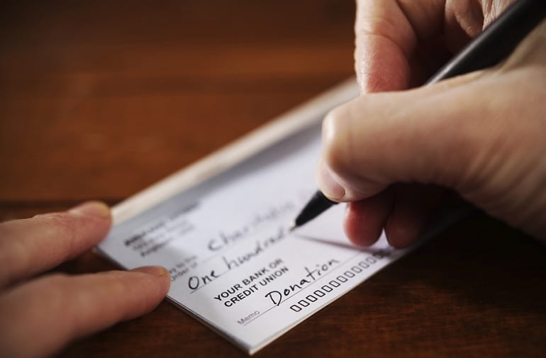 Why writing a cheque to a charity is not enough?