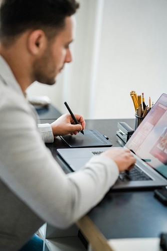 Entrepreneur working late with focus and determination, symbolizing passion and success in business.