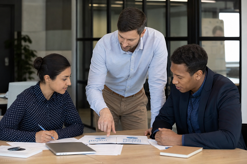 Small business owner discussing leadership challenges with mentor