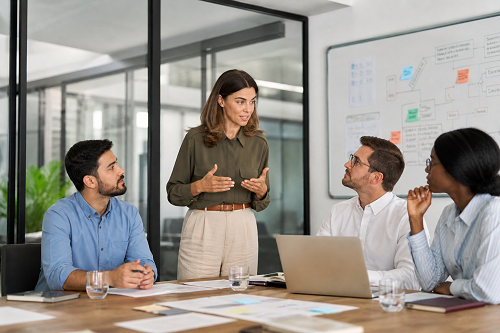 Entrepreneur discussing leadership strategy with mentor