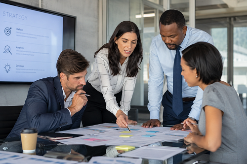 Consultant reviewing operational systems during virtual meeting