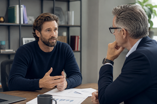 Founder discussing long-term sustainability with strategic advisor