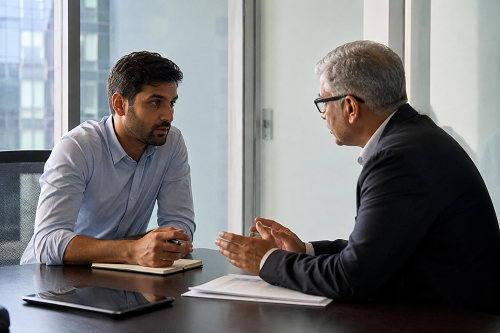Founder having confidential governance discussion with advisor
