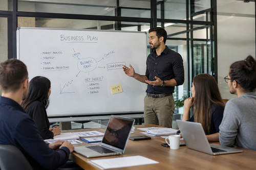 One-to-one coaching discussion between business advisor and entrepreneur