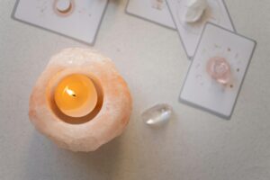 A candle lighting symbolizing developing your intuition and opening your sixth sense