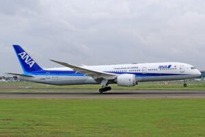 an aeroplane landing smoothly at an airport